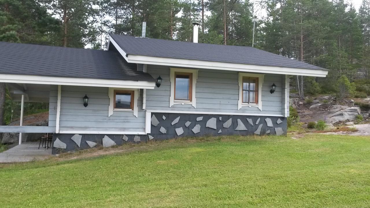 Raemaekkae Holidays Rautalampi Buitenkant foto